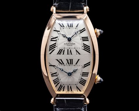 cartier tonneau dual time|Altro.